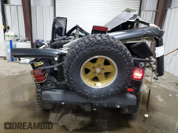 2006 Jeep Wrangler Sport z VIN 1J4FA49SX6P718734, wystawiony jako Copart lot #56516095 z przebiegiem 127 184 mil mil oraz Szkoda całkowita • Salvage title. Historia ofert i sprzedaży dostępna na DreamBid. Obrazek 6.