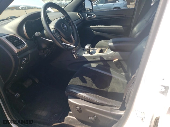 2015 Jeep Grand Cherokee Altitude with VIN 1C4RJFAG0FC725933, listed as a Copart auction lot 52714805 with 119,550 mi miles and Salvage Title. Bid and sale history available at carsss.com. Image 7.