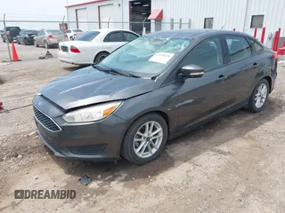 2016 Ford Focus SE with VIN 1FADP3F21GL387227, listed as a IAAI auction lot 42438650 with 59,969 mi miles and . Bid and sale history available at DreamBid. Image 2.