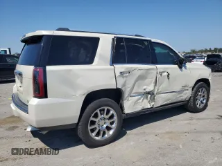 2015 GMC Yukon Denali with VIN 1GKS2CKJ3FR663324, listed as a Copart auction lot 70306614 with 154,234 mi miles and Salvage Title. Bid and sale history available at carsss.com. Image 3.