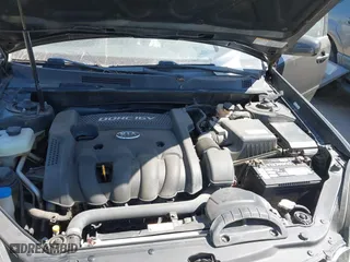 2008 Kia Optima LX with VIN KNAGE123985242231, listed as a IAAI auction lot 41838786 with 217,754 mi miles. Bid and sale history available at carsss.com. Image 10.