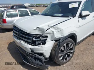 2019 Volkswagen Atlas SEL Premium with VIN 1V2NR2CA4KC612472, listed as a IAAI auction lot 42095556 with 98,397 mi miles and . Bid and sale history available at DreamBid. Image 6.