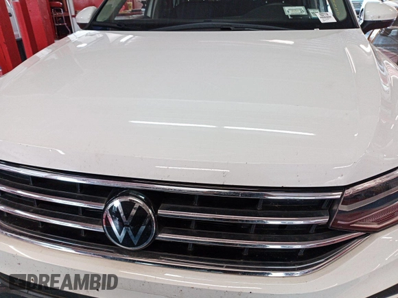 2024 Volkswagen Tiguan SE z VIN 3VV3B7AX0RM082514, wystawiony jako IAAI lot #42796136 z przebiegiem 27 247 mil mil oraz . Historia ofert i sprzedaży dostępna na DreamBid. Obrazek 27.