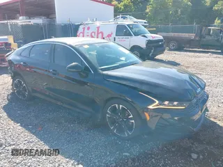 2022 Kia K5 GT-Line z VIN 5XXG64J2XNG095404, wystawiony jako IAAI lot #39716285 z przebiegiem 30 879 mil mil oraz . Historia ofert i sprzedaży dostępna na DreamBid. Obrazek 1.