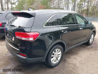 2016 Kia Sorento LX with VIN 5XYPG4A38GG021693, listed as a IAAI auction lot 41745907 with 120,523 mi miles. Bid and sale history available at carsss.com. Image 4.