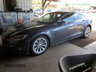2017 Tesla Model S 100D with VIN 5YJSA1E20HF198419, listed as a Copart auction lot 61481605 with 52,853 mi miles and Salvage title. Bid and sale history available at DreamBid. Image 1.