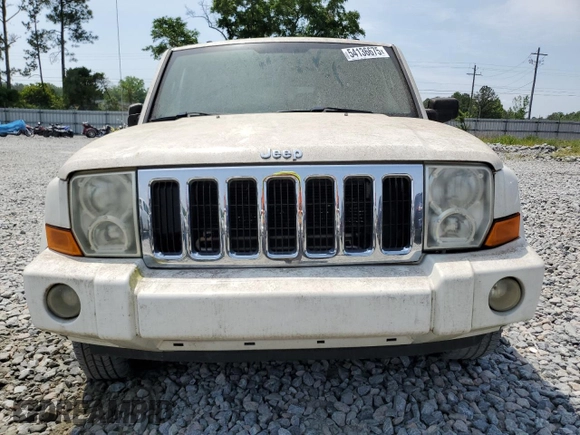 2010 Jeep Commander Sport with VIN 1J4RH4GK0AC103539, listed as a Copart auction lot 54136675 with 243,238 mi miles and Clean Title. Bid and sale history available at carsss.com. Image 5.