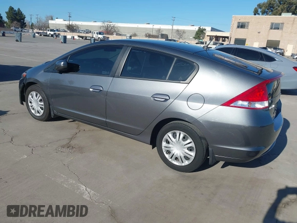 2010 Honda Insight LX with VIN JHMZE2H50AS019740, listed as a IAAI auction lot 41665527 with 74,022 mi miles and . Bid and sale history available at DreamBid. Image 3.
