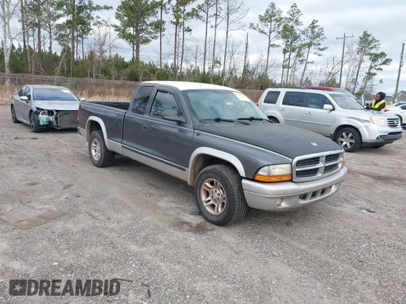 2003 Dodge Dakota SLT with VIN 1D7HL42N63S100130, listed as a IAAI auction lot 41419945 with 185,326 mi miles. Bid and sale history available at carsss.com. Image 1.