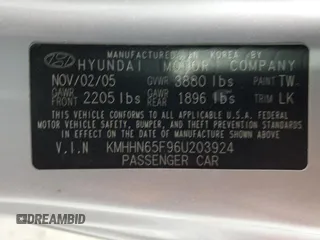 2006 Hyundai Tiburon GT z VIN KMHHN65F96U203924, wystawiony jako Copart lot #43624185 z przebiegiem 120 403 mil mil oraz Szkoda całkowita • Salvage title. Historia ofert i sprzedaży dostępna na DreamBid. Obrazek 12.