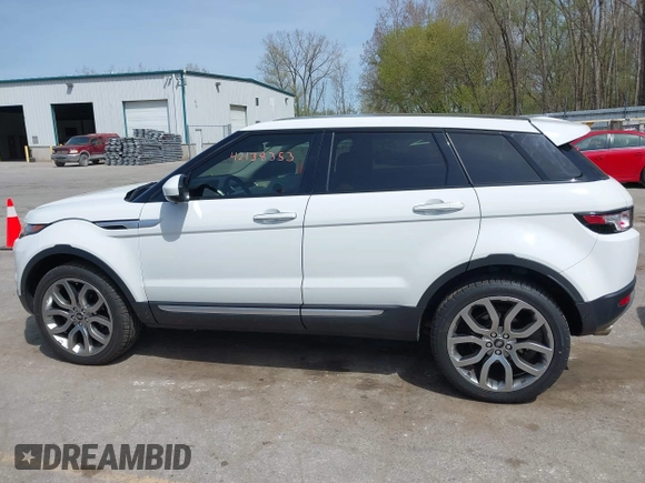 2015 Land Rover Range Rover Evoque Prestige with VIN SALVV2BG4FH076675, listed as a IAAI auction lot 42138353 with 99,751 mi miles and . Bid and sale history available at DreamBid. Image 14.
