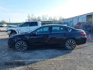 2018 Nissan Altima SV with VIN 1N4AL3AP0JC209978, listed as a IAAI auction lot 41958173 with 104,425 mi miles and . Bid and sale history available at DreamBid. Image 14.