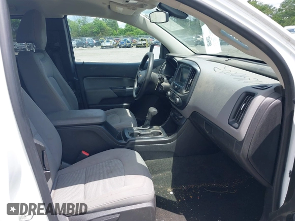 2018 Chevrolet Colorado 2WD Work Truck z VIN 1GCHSBEN4J1155188, wystawiony jako IAAI lot #42340002 z przebiegiem 83 422 mil mil oraz . Historia ofert i sprzedaży dostępna na DreamBid. Obrazek 5.