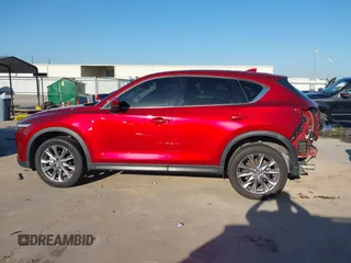 2020 Mazda CX-5 Grand Touring with VIN JM3KFADM7L0729537, listed as a IAAI auction lot 41864569 with 82,998 mi miles. Bid and sale history available at carsss.com. Image 15.