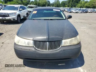 2001 Lincoln Town Car Cartier L z VIN 1LNHM85W71Y624315, wystawiony jako Copart lot #60479385 z przebiegiem 171 485 mil mil oraz Czysty tytuł • Clean title. Historia ofert i sprzedaży dostępna na DreamBid. Obrazek 5.