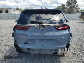 2020 Honda CR-V EX z VIN 2HKRW2H54LH624845, wystawiony jako Copart lot #58128415 z przebiegiem 42 085 mil mil oraz Szkoda całkowita • Salvage title. Historia ofert i sprzedaży dostępna na DreamBid. Obrazek 6.
