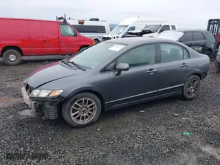 2011 Honda Civic Sdn LX with VIN 2HGFA1F52BH309050, listed as a IAAI auction lot 41588543 with 181,871 mi miles. Bid and sale history available at carsss.com. Image 2.