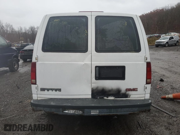 1999 GMC Safari Cargo with VIN 1GTDM19W1XB536330, listed as a Copart auction lot 80887864 with Not Provided miles and Salvage Title. Bid and sale history available at carsss.com. Image 6.