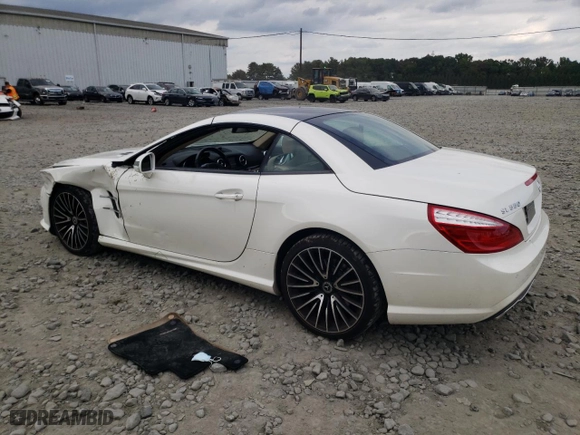 2013 Mercedes-Benz SL-Class SL 550 with VIN WDDJK7DA1DF020986, listed as a Copart auction lot 74235064 with 86,015 mi miles and Salvage Title. Bid and sale history available at carsss.com. Image 2.