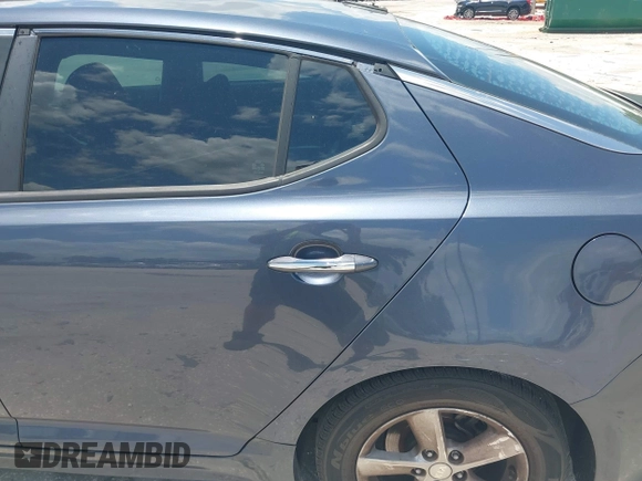 2015 Kia Optima LX with VIN 5XXGM4A71FG472575, listed as a IAAI auction lot 42581639 with 189,348 mi miles and . Bid and sale history available at DreamBid. Image 16.