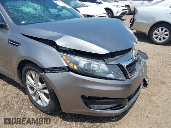 2013 Kia Optima EX z VIN 5XXGN4A7XDG258162, wystawiony jako IAAI lot #42228606 z przebiegiem 129 296 mil mil oraz . Historia ofert i sprzedaży dostępna na DreamBid. Obrazek 17.