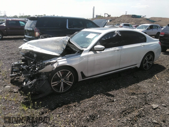 2017 BMW 7 Series 750i with VIN WBA7F0C35HGM21649, listed as a IAAI auction lot 37362691 with 10,000 mi miles and . Bid and sale history available at DreamBid. Image 17.