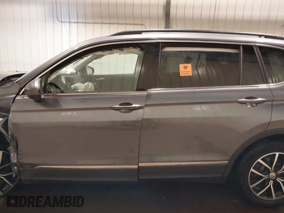 2021 Volkswagen Tiguan SE with VIN 3VV3B7AX3MM118463, listed as a IAAI auction lot 42138702 with 48,058 mi miles and . Bid and sale history available at DreamBid. Image 15.
