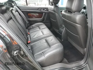 2015 Lincoln MKS z VIN 1LNHL9DK6FG604609, wystawiony jako Copart lot #56243135 z przebiegiem 82 622 mil mil oraz Szkoda całkowita • Salvage title. Historia ofert i sprzedaży dostępna na DreamBid. Obrazek 10.