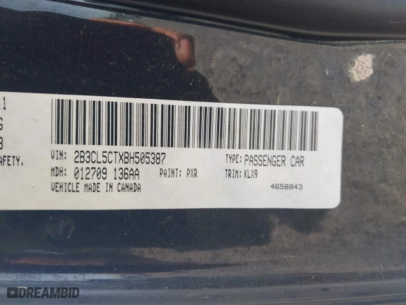 2011 Dodge Charger Road/Track with VIN 2B3CL5CTXBH505387, listed as a IAAI auction lot 42026220 with 205,429 mi miles. Bid and sale history available at carsss.com. Image 9.