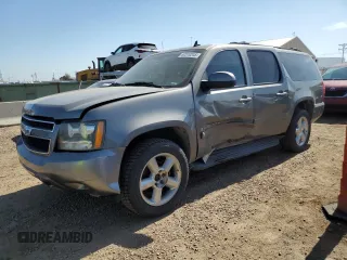 2007 Chevrolet Suburban LT with VIN 1GNFK16337J235791, listed as a Copart auction lot 62310245 with 227,780 mi miles and Salvage title. Bid and sale history available at DreamBid. Image 1.