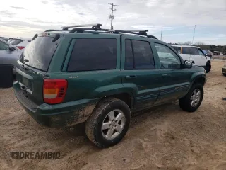 1999 Jeep Grand Cherokee Limited with VIN 1J4GW68S1XC744666, listed as a Copart auction lot 88337895 with 243,480 mi miles and Salvage Title. Bid and sale history available at carsss.com. Image 3.