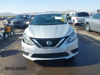 2017 Nissan Sentra S z VIN 3N1AB7AP9HY277592, wystawiony jako IAAI lot #42287903 z przebiegiem 186 876 mil mil oraz . Historia ofert i sprzedaży dostępna na DreamBid. Obrazek 13.
