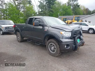 2012 Toyota Tundra z VIN 5TFUW5F14CX255128, wystawiony jako IAAI lot #42176828 z przebiegiem 93 458 mil mil oraz . Historia ofert i sprzedaży dostępna na DreamBid. Obrazek 1.