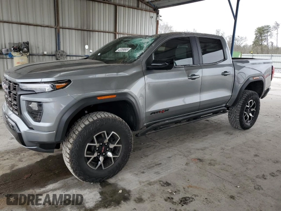 2024 GMC Canyon 4WD AT4X with VIN 1GTP6EEK1R1158021, listed as a Copart auction lot 43359665 with 14,120 mi miles and Salvage Title. Bid and sale history available at carsss.com. Image 1.