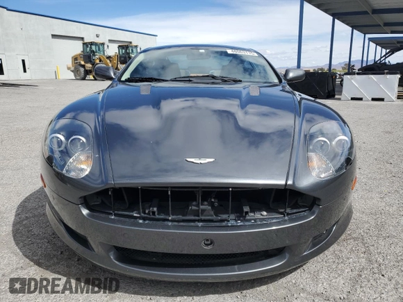 2007 Aston Martin DB9 z VIN SCFAD01A77GA07808, wystawiony jako Copart lot #48063115 z przebiegiem 53 195 mil mil oraz Szkody całkowita. Historia ofert i sprzedaży dostępna na DreamBid. Obrazek 5.