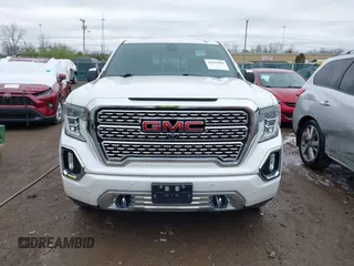 2020 GMC Sierra 1500 Denali with VIN 3GTU9FEL8LG295605, listed as a IAAI auction lot 41922060 with 65,561 mi miles and . Bid and sale history available at DreamBid. Image 12.