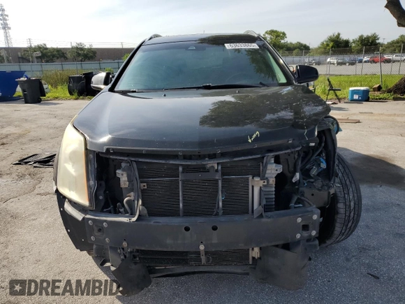 2015 Cadillac SRX Performance Collection with VIN 3GYFNCE32FS558430, listed as a Copart auction lot 63633865 with 153,729 mi miles and Salvage title. Bid and sale history available at DreamBid. Image 5.