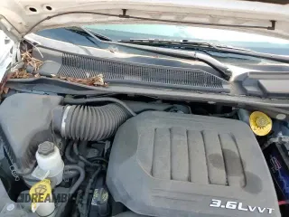 2018 Dodge Grand Caravan SE with VIN 2C4RDGBG2JR148110, listed as a Copart auction lot 70198185 with 86,779 mi miles and Salvage title. Bid and sale history available at DreamBid. Image 14.