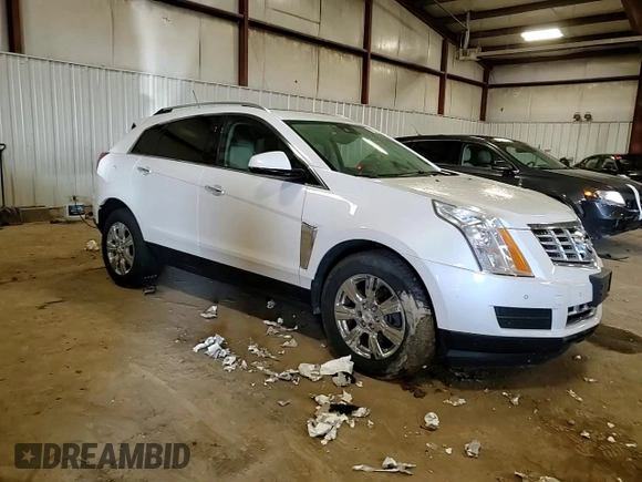 2015 Cadillac SRX Luxury Collection z VIN 3GYFNEE33FS641781, wystawiony jako Copart lot #50765905 z przebiegiem Nie podano mil oraz Szkody całkowita. Historia ofert i sprzedaży dostępna na DreamBid. Obrazek 11.