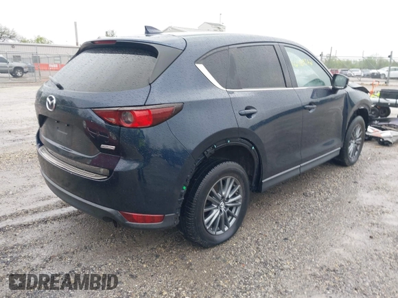 2017 Mazda CX-5 Touring z VIN JM3KFBCL4H0156571, wystawiony jako IAAI lot #42183562 z przebiegiem 135 595 mil mil oraz . Historia ofert i sprzedaży dostępna na DreamBid. Obrazek 4.