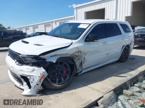 2021 Dodge Durango SRT 392 with VIN 1C4SDJGJ8MC724105, listed as a IAAI auction lot 41883925 with 31,184 mi miles and . Bid and sale history available at DreamBid. Image 17.