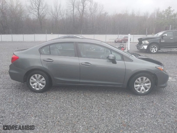 2012 Honda Civic Sdn LX with VIN 2HGFB2F56CH578205, listed as a IAAI auction lot 41016919 with 104,515 mi miles. Bid and sale history available at carsss.com. Image 13.