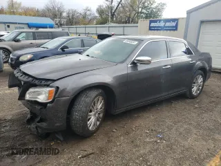 2013 Chrysler 300 with VIN 2C3CCAKT5DH686527, listed as a Copart auction lot 80895034 with 128,703 mi miles and Salvage Title. Bid and sale history available at carsss.com. Image 1.