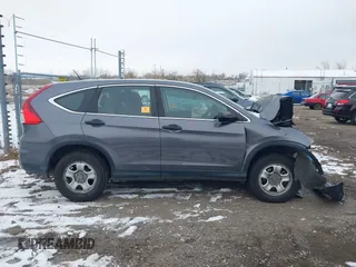 2015 Honda CR-V LX with VIN 2HKRM4H3XFH619055, listed as a IAAI auction lot 40989227 with 113,332 mi miles and . Bid and sale history available at DreamBid. Image 13.