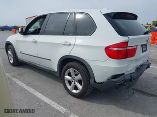2010 BMW X5 35d with VIN 5UXFF0C52ALT75063, listed as a IAAI auction lot 41924828 with 104,513 mi miles. Bid and sale history available at carsss.com. Image 3.