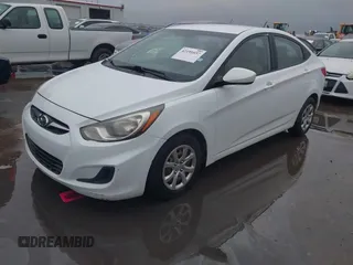 2013 Hyundai Accent GLS with VIN KMHCT4AE9DU453033, listed as a IAAI auction lot 42191037 with 163,171 mi miles and . Bid and sale history available at carsss.com. Image 2.