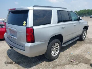 2019 Chevrolet Tahoe LT with VIN 1GNSKBKC8KR363433, listed as a IAAI auction lot 42567045 with 122,956 mi miles and . Bid and sale history available at DreamBid. Image 4.