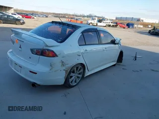 2014 Mitsubishi Lancer GT with VIN JA32U8FWXEU023081, listed as a IAAI auction lot 41609349 with 1 mi miles. Bid and sale history available at carsss.com. Image 4.
