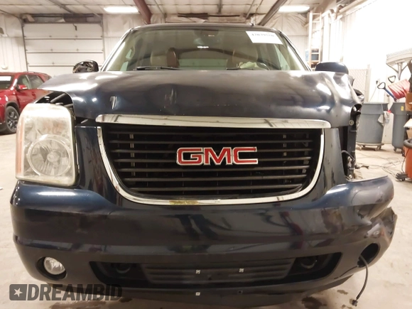 2007 GMC Yukon SLT z VIN 1GKFK130X7J115798, wystawiony jako IAAI lot #42039550 z przebiegiem 263 539 mil mil oraz . Historia ofert i sprzedaży dostępna na DreamBid. Obrazek 13.