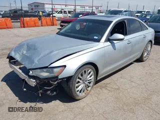 2013 Audi A6 Premium Plus with VIN WAUDFAFCXDN051423, listed as a IAAI auction lot 42249789 with 124,372 mi miles and . Bid and sale history available at DreamBid. Image 2.